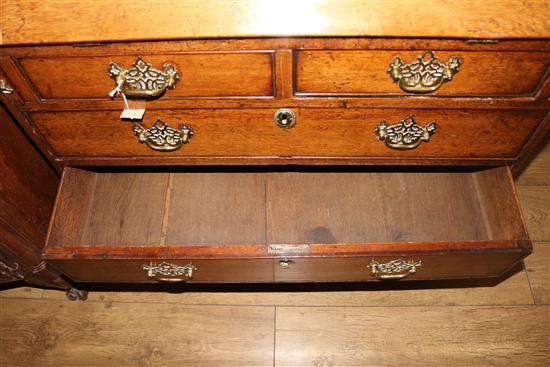A George III oak bureau, W.91cm